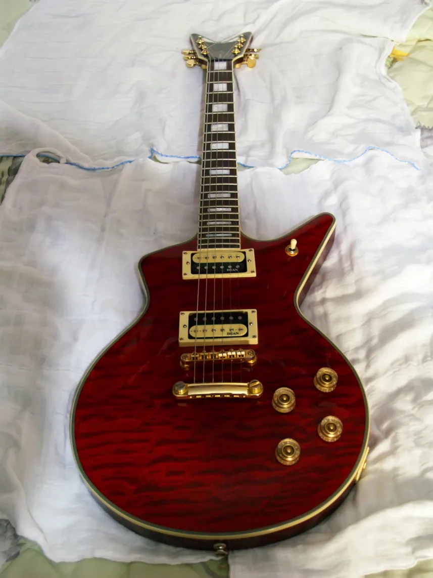 Dean Cadillac Select with quilted cherry top and gold hardware
